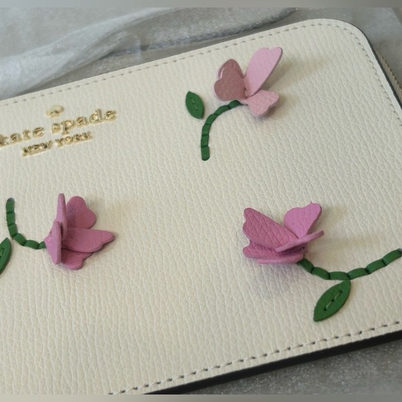 kate spade Handbags - Kate Spade Cream Lucy Wristlet with Pink Floral 3D Accents